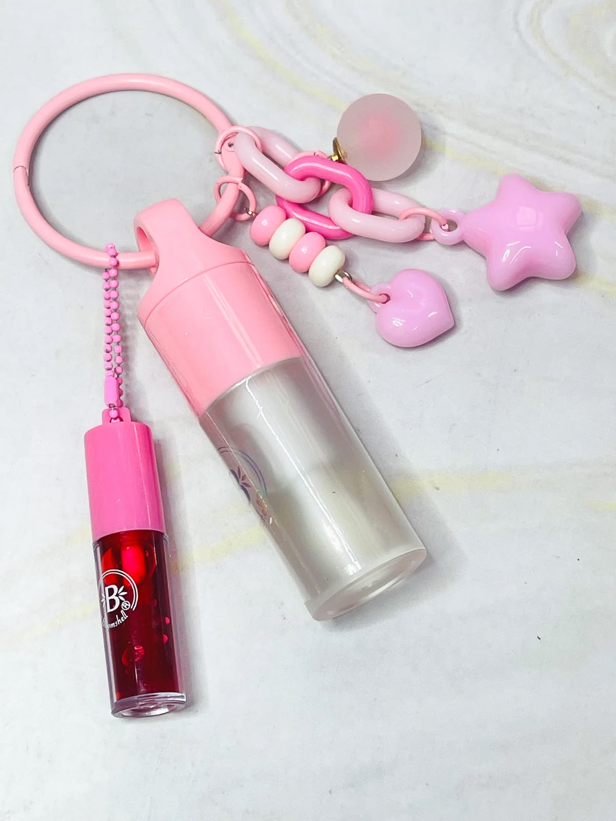 gloss llavero duo bloom bow bloomshell