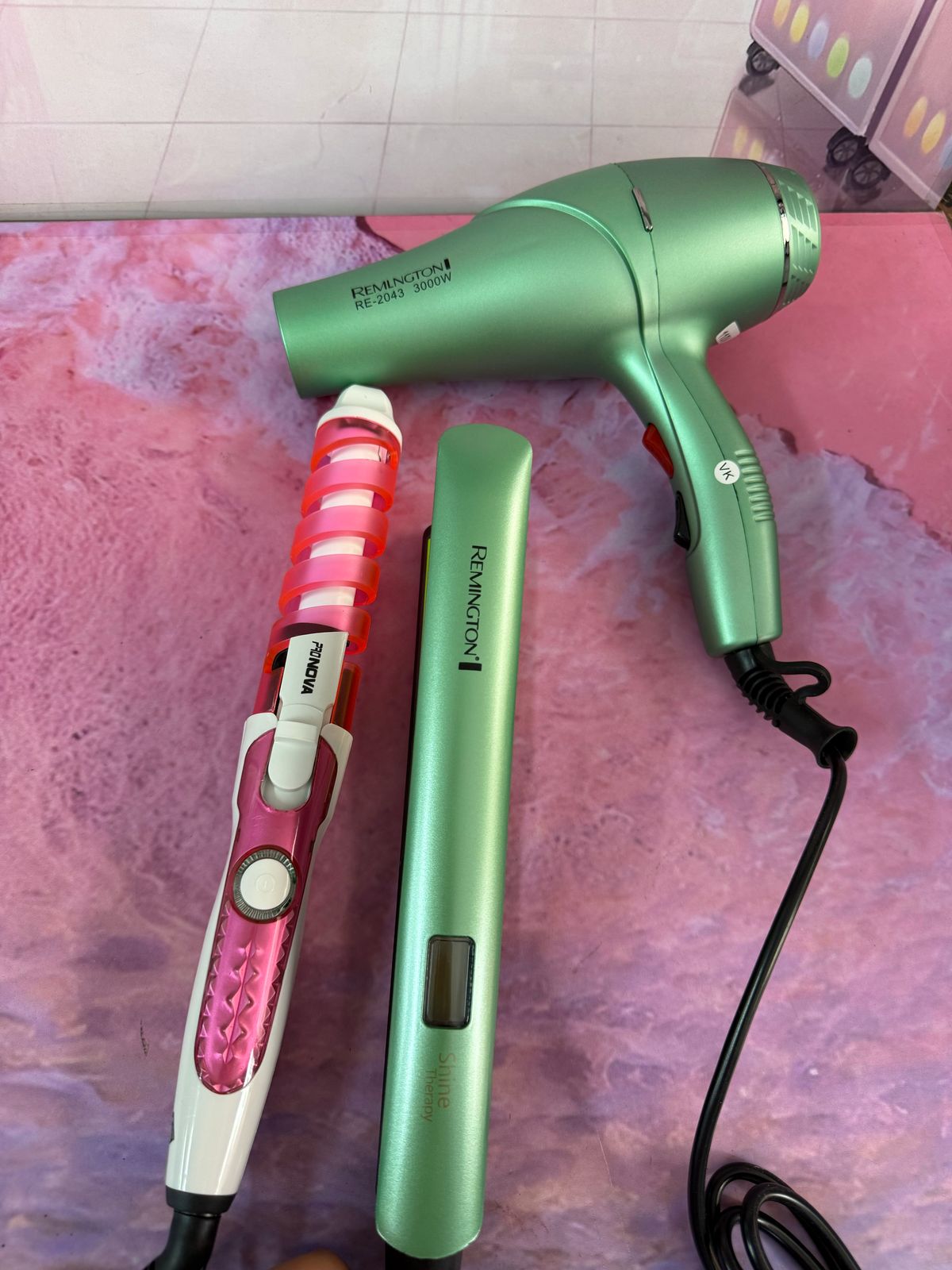 Combo secador de aguacate mas plancha AAA y rizadora nova