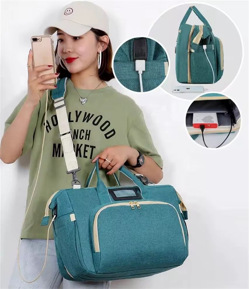 pañalera multifuncional tipo bolso viajero