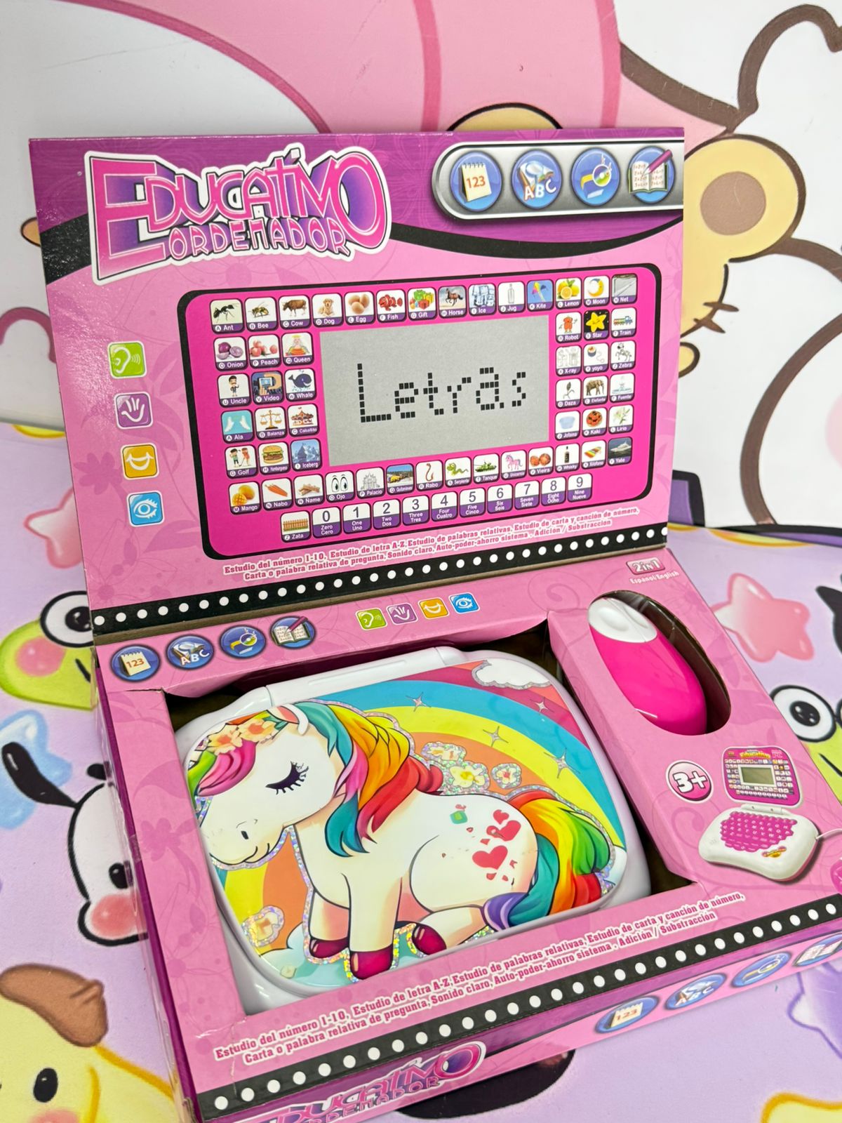computador infantil pequeño con mouse