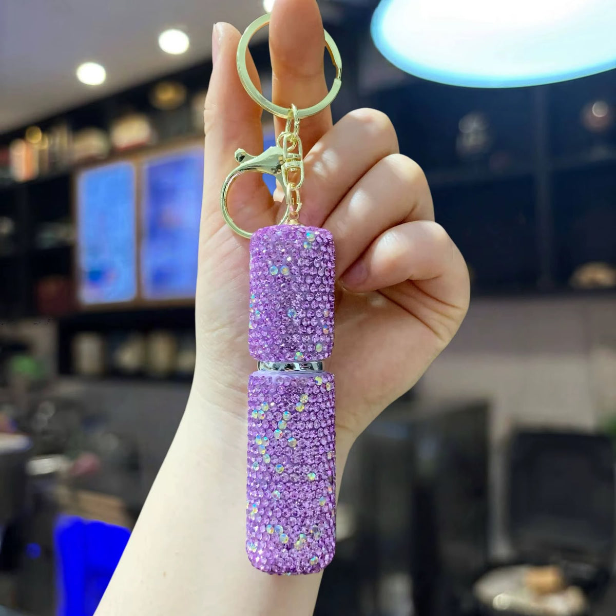 llavero para perfume brillante