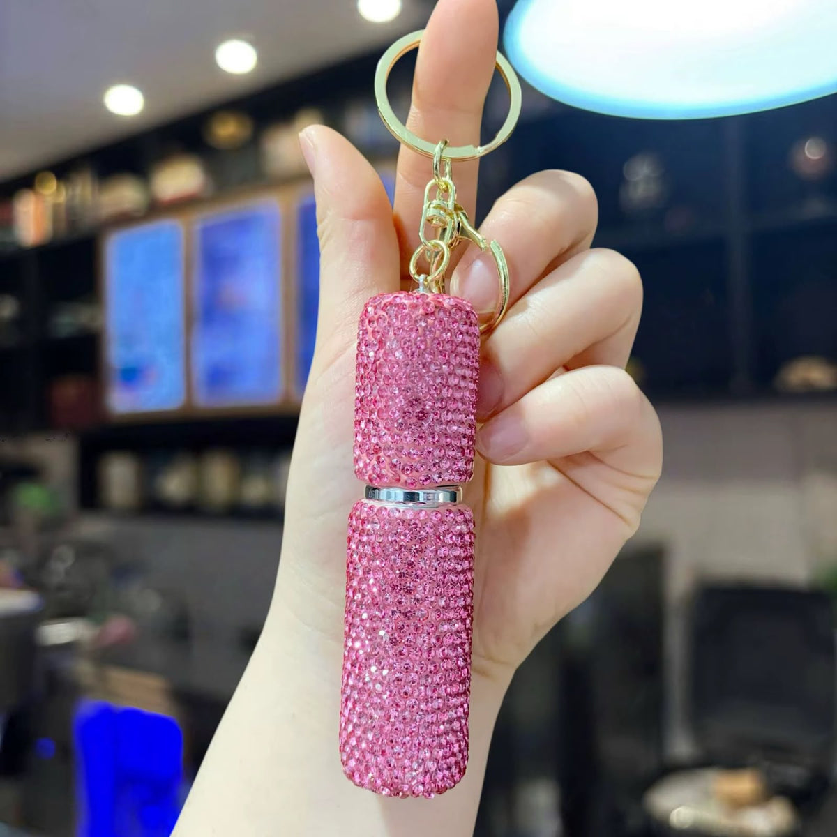 llavero para perfume brillante